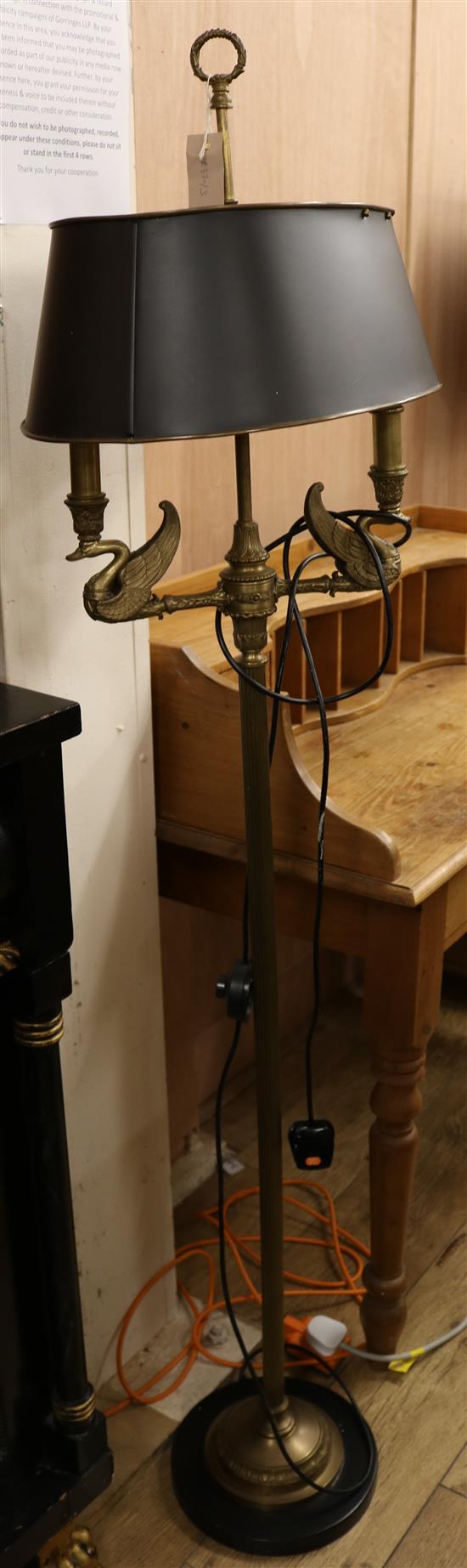 A brass standing lamp